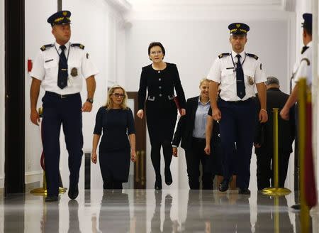 Poland's parliament speaker Ewa Kopacz (C) walks before a session at Parliament in Warsaw September 10, 2014. REUTERS/Kacper Pempel