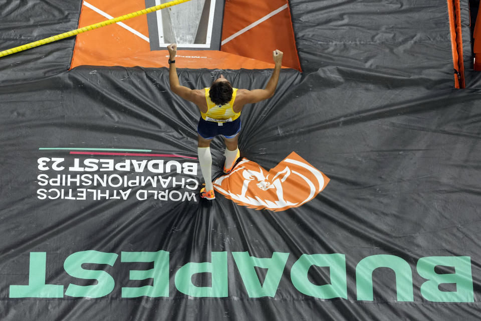 Armand Duplantis, of Sweden, celebrates after clearing the bar in the Men's pole vault final during the World Athletics Championships in Budapest, Hungary, Saturday, Aug. 26, 2023. Duplantis finished first. (AP Photo/David J. Phillip)