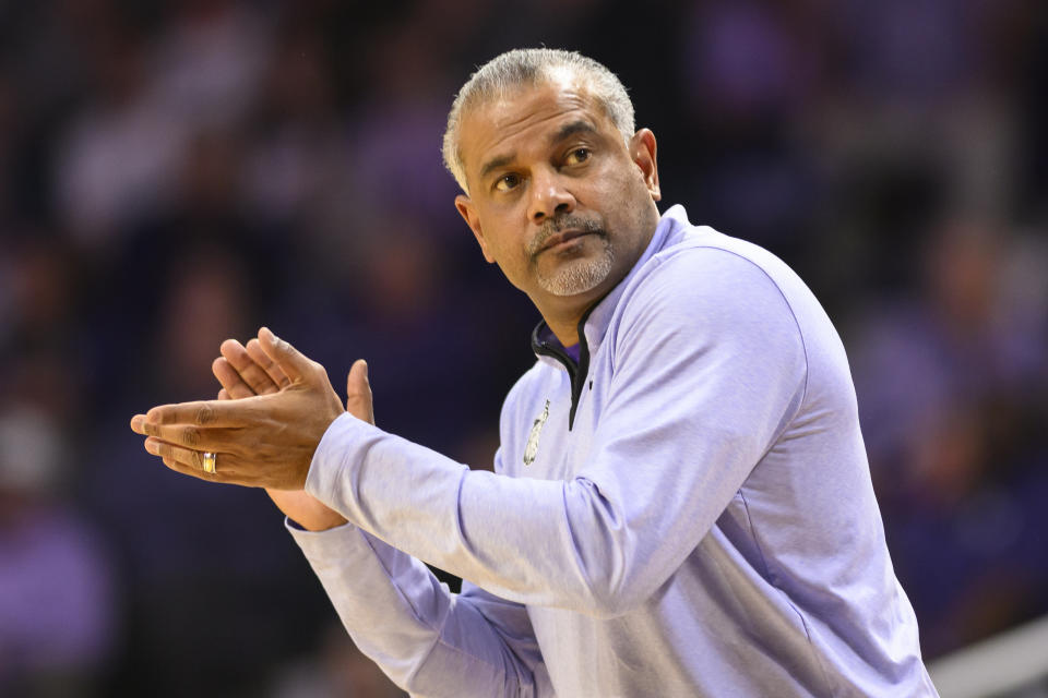 Kansas State coach Jerome Tang cheers on the team against Oklahoma during the first half of an NCAA college basketball game in Manhattan, Kan., Wednesday, March 1, 2023. (AP Photo/Reed Hoffmann)