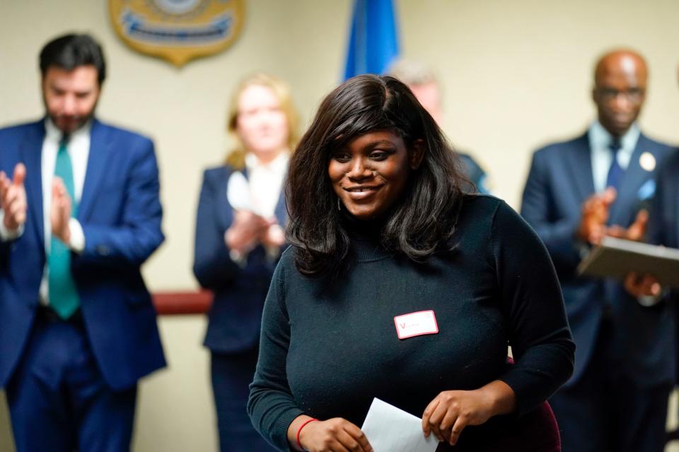 The room applauds Treia Boozier after she speaks on her own experience as a survivor and now youth activist during a press conference held to announce the partnership between HSI, the Global Center on Human Trafficking and Montclair State University to combat human trafficking on Wednesday, Jan. 25, 2023, in Newark.