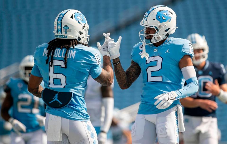 North Carolina wide receiver Gavin Blackwell (2) congratulates Nate McCollum (6) after a touchdown during the Tar Heels’ spring football game on Saturday, April 15, 2023 at Kenan Stadium in Chapel Hill, N.C.