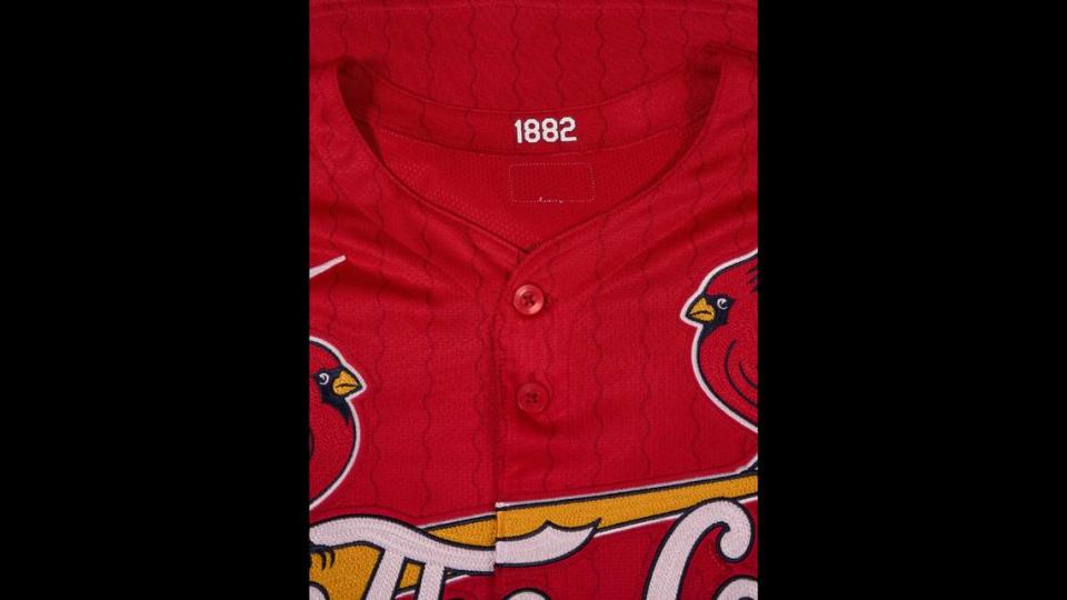 1882 inside collar of new uniform. The St. Louis Cardinals, with help from Grammy Award-winning hip-hop artist and St. Louis native, Nelly, unveiled the team’s highly anticipated Nike MLB City Connect Series uniform and merchandise line on May 20, 2024. The new uniforms, which feature red jerseys paired with white pants, includes a modern take on the iconic “Birds on the Bat” with chain-stitched lettering showcasing a familiar nickname for St. Louis (“The Lou”) that gained mainstream popularity through use by Nelly in his debut single and album, Country Grammar. The Cardinals’ City Connect jerseys mark the first time in franchise history that a red jersey will be produced for regular season play.