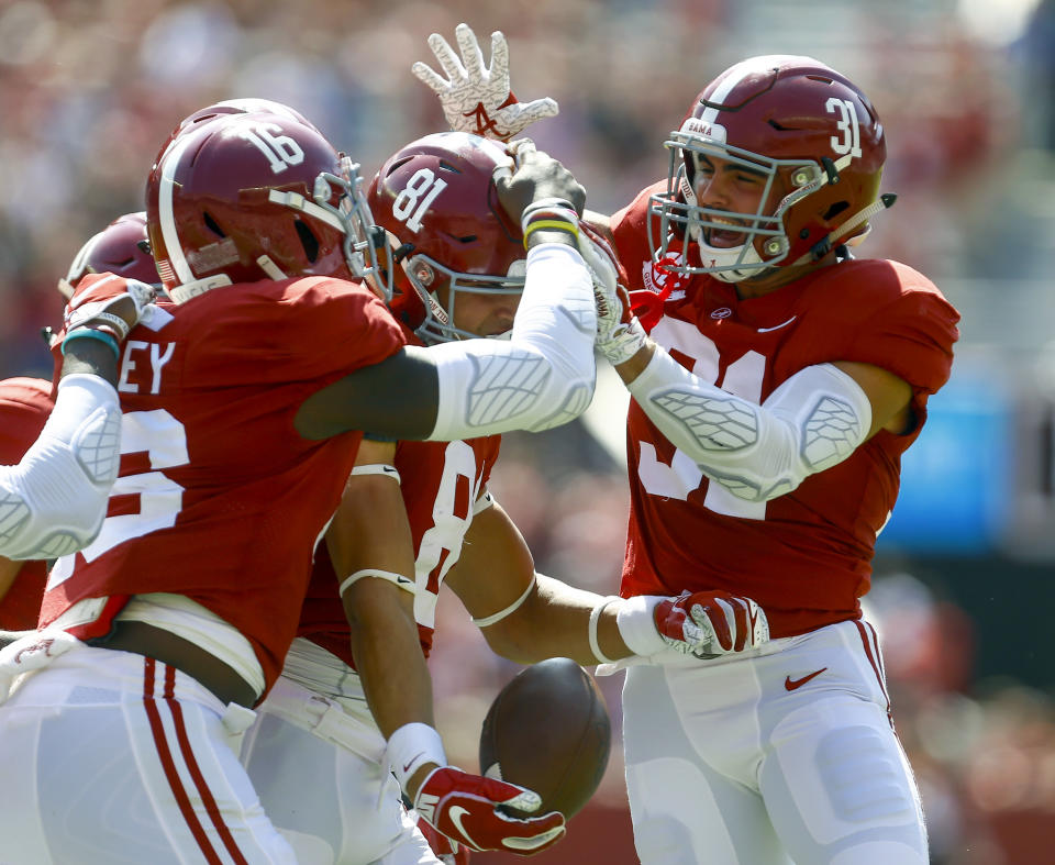 Alabama wide receiver Derek Kief (81) celebrates with teammates after blocking a punt against Louisiana-Lafayette during the first half of an NCAA college football game, Saturday, Sept. 29, 2018, in Tuscaloosa, Ala. (AP Photo/Butch Dill)