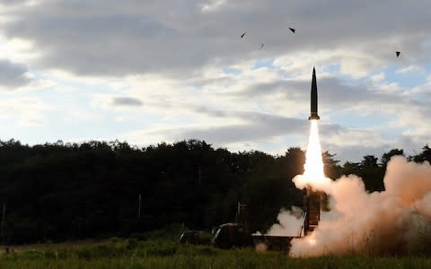 A South Korean Hyunmoo-II missile is fired toward the East Sea in response to the latest North Korean missile test - Credit: EPA