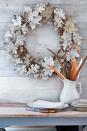 <p>Another neutral fall wreath, this one could be made out of the most basic of materials (which means it's pretty affordable to make, too). </p><p><strong><em><a href="https://www.countryliving.com/diy-crafts/g1988/fall-craft-projects/?slide=20" rel="nofollow noopener" target="_blank" data-ylk="slk:Get the tutorial at Country Living.;elm:context_link;itc:0;sec:content-canvas" class="link ">Get the tutorial at Country Living.</a></em></strong></p>