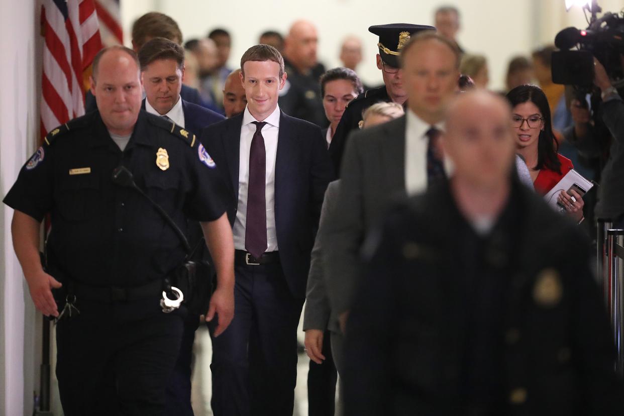 mark zuckerberg congress WASHINGTON, DC - OCTOBER 23: Facebook co-founder and CEO Mark Zuckerberg leaves the Rayburn House Office Building after testifying before the House Financial Services Committee for six hours on Capitol Hill October 23, 2019 in Washington, DC. Zuckerberg testified about Facebook's proposed cryptocurrency Libra, how his company will handle false and misleading information by political leaders during the 2020 campaign and how it handles its users’ data and privacy. (Photo by Chip Somodevilla/Getty Images)