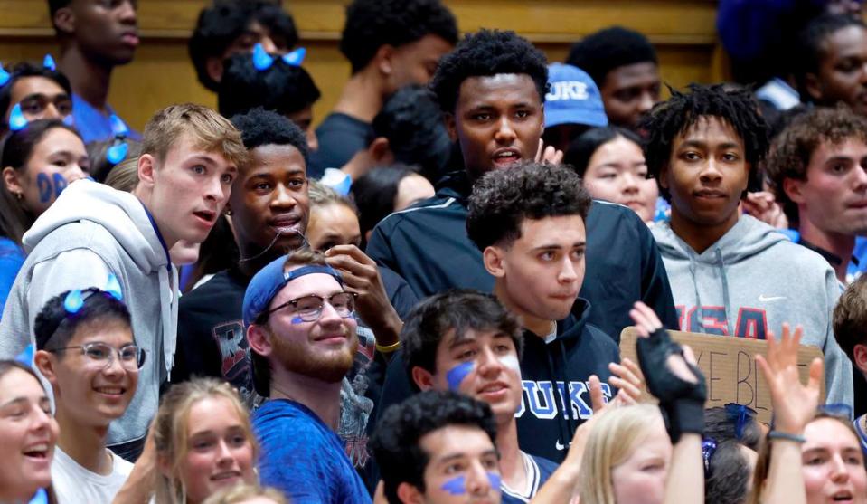 From left Duke recruits Cooper Flagg, VJ Edgecombe, Patrick Ngongba II,Isaiah Evans and Darren Harris, in front, watch the Blue Devils’ scrimmage during Duke basketball’s Countdown to Craziness at Cameron Indoor Stadium in Durham, N.C., Friday, Oct. 20, 2023.