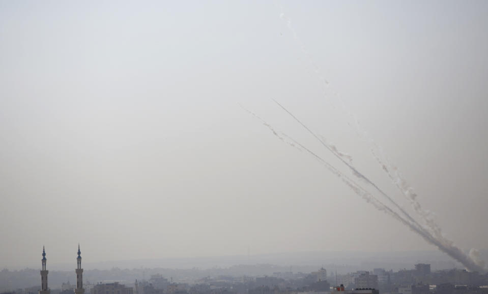 Rockets are launched from Gaza Strip to Israel, Tuesday, Nov. 12, 2019. Israel killed a senior Islamic Jihad commander in Gaza early Tuesday in a resumption of pinpointed targeting that threatens a fierce round of cross-border violence with Palestinian militants. (AP Photo/Hatem Moussa)