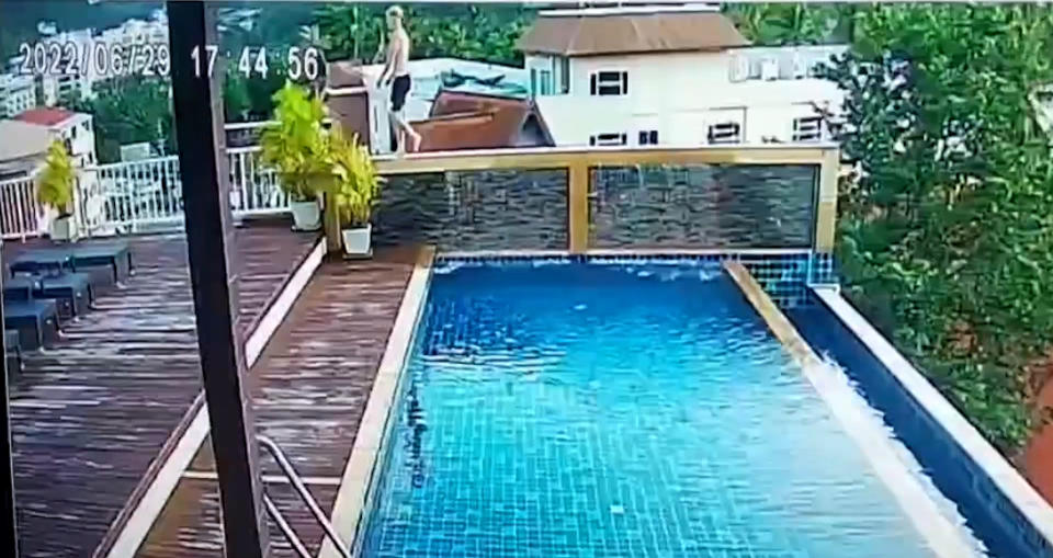 CCTV shows Australian tourist Joshua James Connell, 19, walking along a wall at the side of the swimming pool in Thailand. Source: Australscope