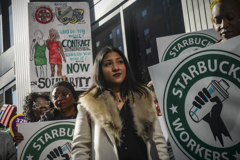 A coalition of unions and supporters join Starbucks workers at a rally outside a midtown Manhattan Starbucks coffee store, calling for a "fair schedules and wages," Thursday, Nov. 16, 2023, in New York. (AP Photo/Bebeto Matthews)