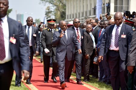 FILE PHOTO: Democratic Republic of Congo's outgoing President Joseph Kabila arrives to attend his successor Felix Tshisekedi's inauguration