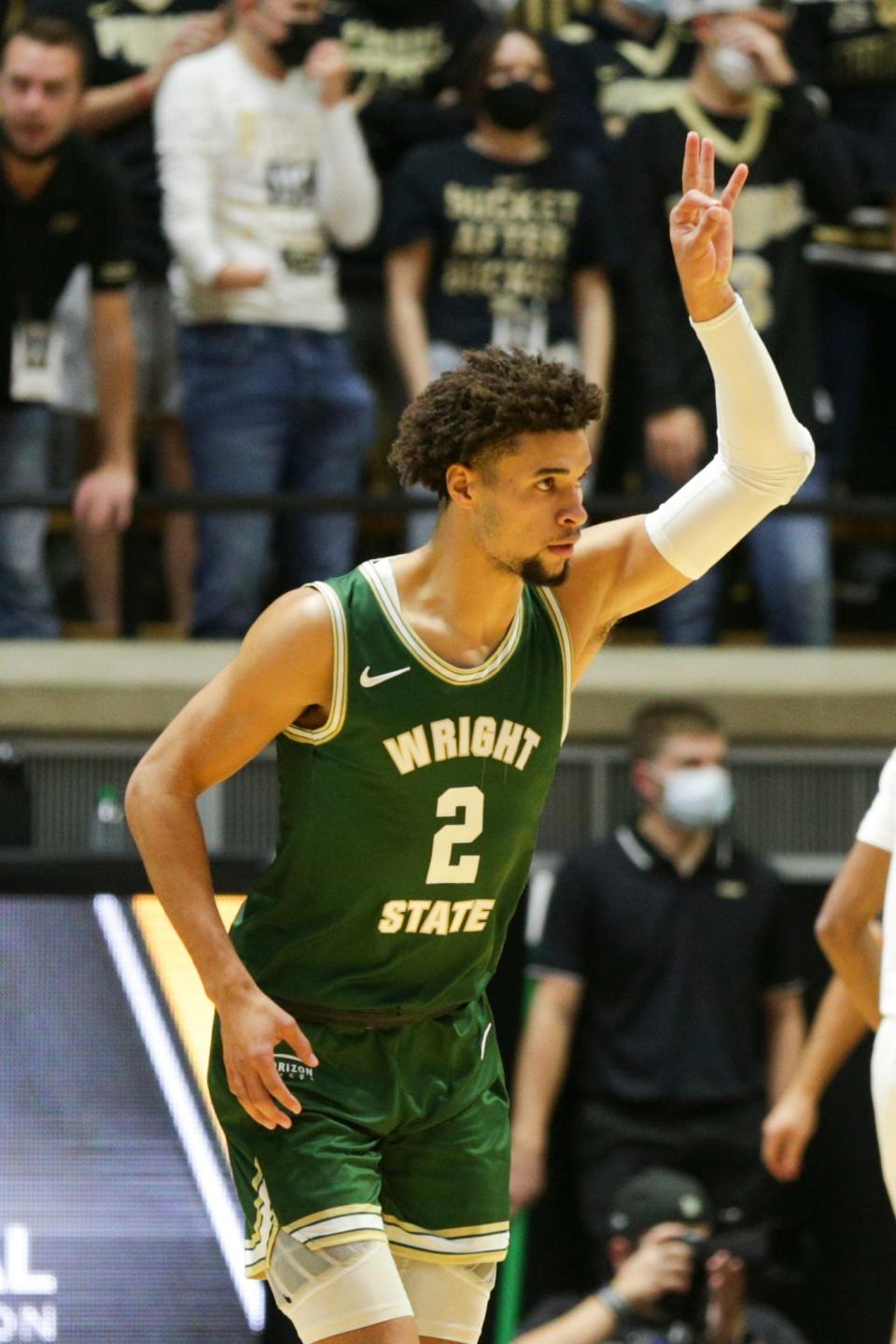 Wright State guard Tanner Holden (2) celebrates after a 3-pointer during the first half of an NCAA men's basketball game, Tuesday, Nov. 16, 2021 at Mackey Arena in West Lafayette.