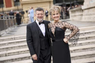 Andy Serkis, left, and Lorraine Ashbourne pose for photographers upon arrival at the Olivier Awards on Sunday, April 14, 2024, in London. (Photo by Vianney Le Caer/Invision/AP)