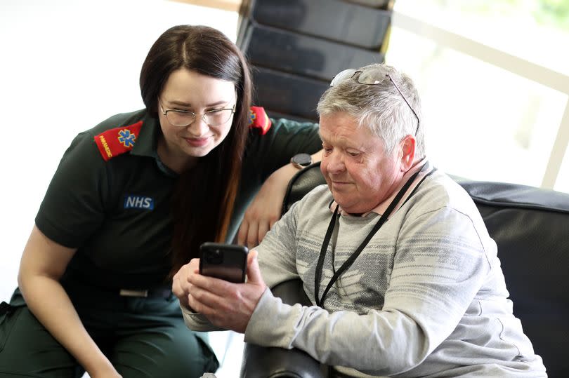 Duncan Stuart with paramedic Paulina Wieclaw, who helped to save his life.