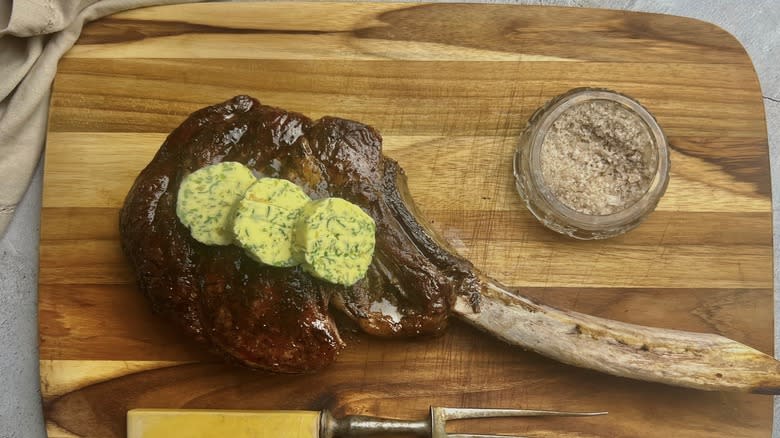 tomahawk steak with butter
