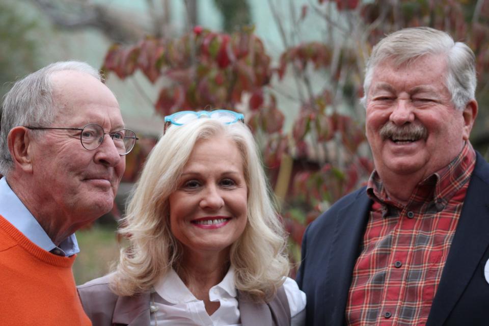FRIENDS — Retired U.S. Sen. Lamar Alexander, from left, the Museum of Appalachia's Elaine Meyer and Lt. Gov. Randy McNally of Oak Ridge share a laugh prior to the ribbon-cutting ceremony for the Norris museum's new exhibit,  "The Mountaineers' Sacrifice and Renewal."