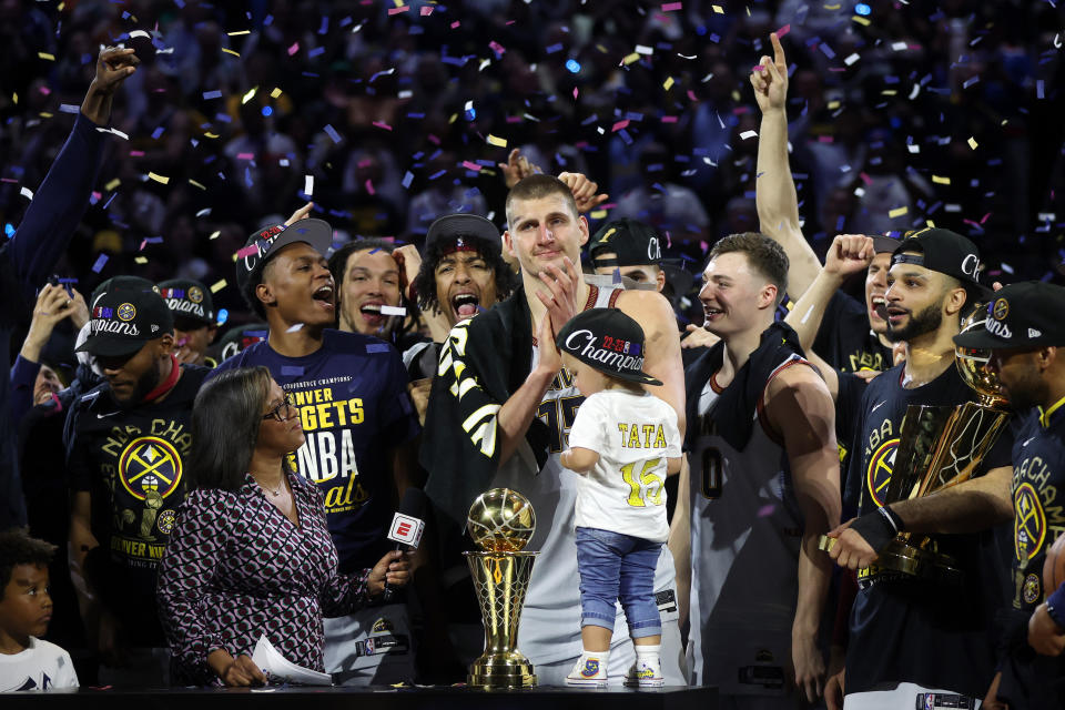 The defending champion Nuggets tip things off tonight in Denver. (Matthew Stockman/Getty Images)