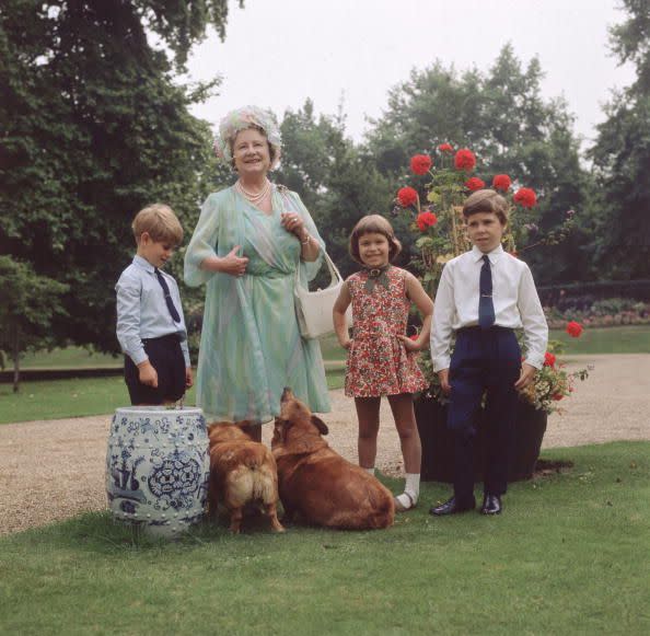 <p>On The Queen Mother's 70th birthday, she and her grandchildren Prince Edward, Lady Sarah Armstrong-Jones, and Viscount Linley hang out with some corgis.</p>