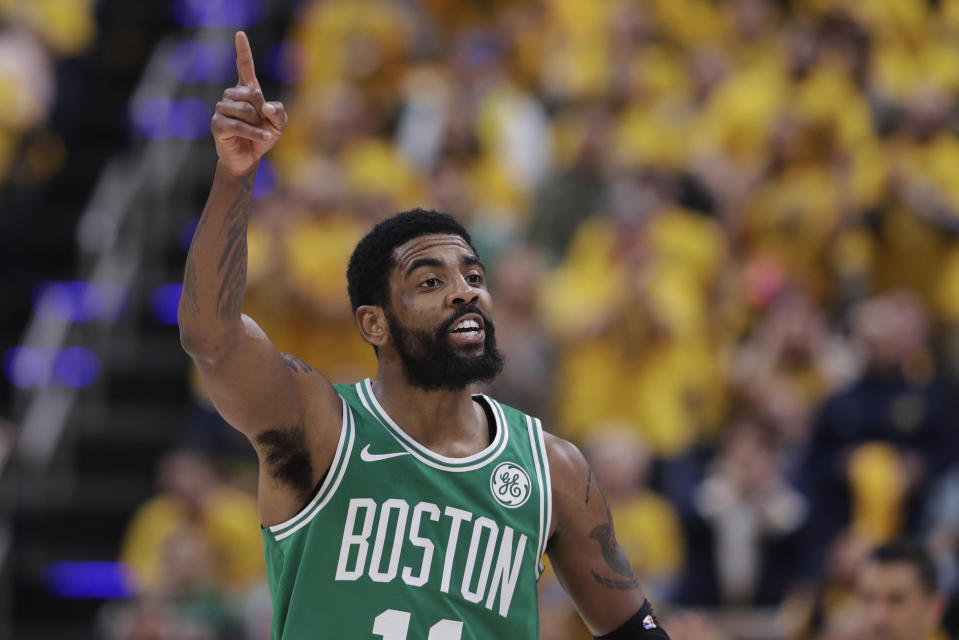 Boston Celtics guard Kyrie Irving gestures during the first half of Game 3 of the team's NBA basketball first-round playoff series against the Indiana Pacers, Friday, April 19, 2019, in Indianapolis. (AP Photo/Darron Cummings)