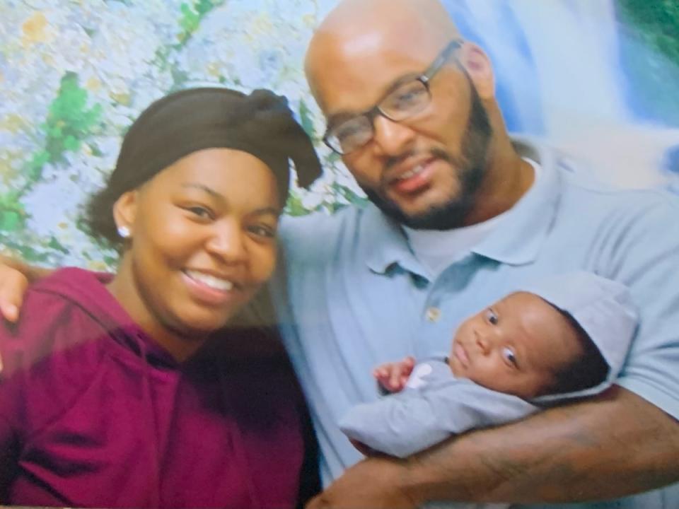 Kevin Johnson, 37, with his daughter Khorry Ramey, 19, and grandchild before he was executed on Tuesday (ACLU)