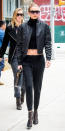 <p>The model proved she's a true New Yorker when she stepped out rocking an all-black outfit in the city. For the occasion, Hadid chose a cropped turtleneck and matching sweatpants that she paired with a leather bomber jacket, mesh booties, a Sophie Hulme square tote, and statement sunnies.</p>