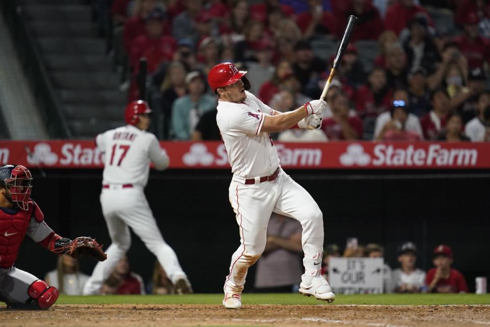 The Angels'  Mike Trout doubles to center field during the fifth inning May 6, 2022.