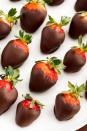 <p><a href="https://www.delish.com/holiday-recipes/valentines-day/g3228/chocolate-covered-strawberries/" rel="nofollow noopener" target="_blank" data-ylk="slk:Chocolate-covered strawberries;elm:context_link;itc:0;sec:content-canvas" class="link ">Chocolate-covered strawberries</a> are a staple <a href="https://www.delish.com/holiday-recipes/valentines-day/g1738/fancy-valentines-dessert-recipes/" rel="nofollow noopener" target="_blank" data-ylk="slk:Valentine's Day dessert;elm:context_link;itc:0;sec:content-canvas" class="link ">Valentine's Day dessert</a>, but they're also a perfect way to feed your Galentine's Day crowd. While we've done our fair share of creative takes on this sweet treat, from <a href="https://www.delish.com/cooking/recipe-ideas/recipes/a51437/chocolate-strawberry-cheesecakes-recipe/" rel="nofollow noopener" target="_blank" data-ylk="slk:chocolate strawberry cheesecakes;elm:context_link;itc:0;sec:content-canvas" class="link ">chocolate strawberry cheesecakes</a> to <a href="https://www.delish.com/cooking/recipe-ideas/a21101553/chocolate-covered-strawberry-shooters-recipe/" rel="nofollow noopener" target="_blank" data-ylk="slk:chocolate-covered strawberry shooters;elm:context_link;itc:0;sec:content-canvas" class="link ">chocolate-covered strawberry shooters</a>, you really can't beat the simple, easy classic.</p><p>Get the <strong><a href="https://www.delish.com/cooking/recipe-ideas/a58094/how-to-make-chocolate-covered-strawberries/" rel="nofollow noopener" target="_blank" data-ylk="slk:Chocolate-Covered Strawberries recipe;elm:context_link;itc:0;sec:content-canvas" class="link ">Chocolate-Covered Strawberries recipe</a></strong>. </p>