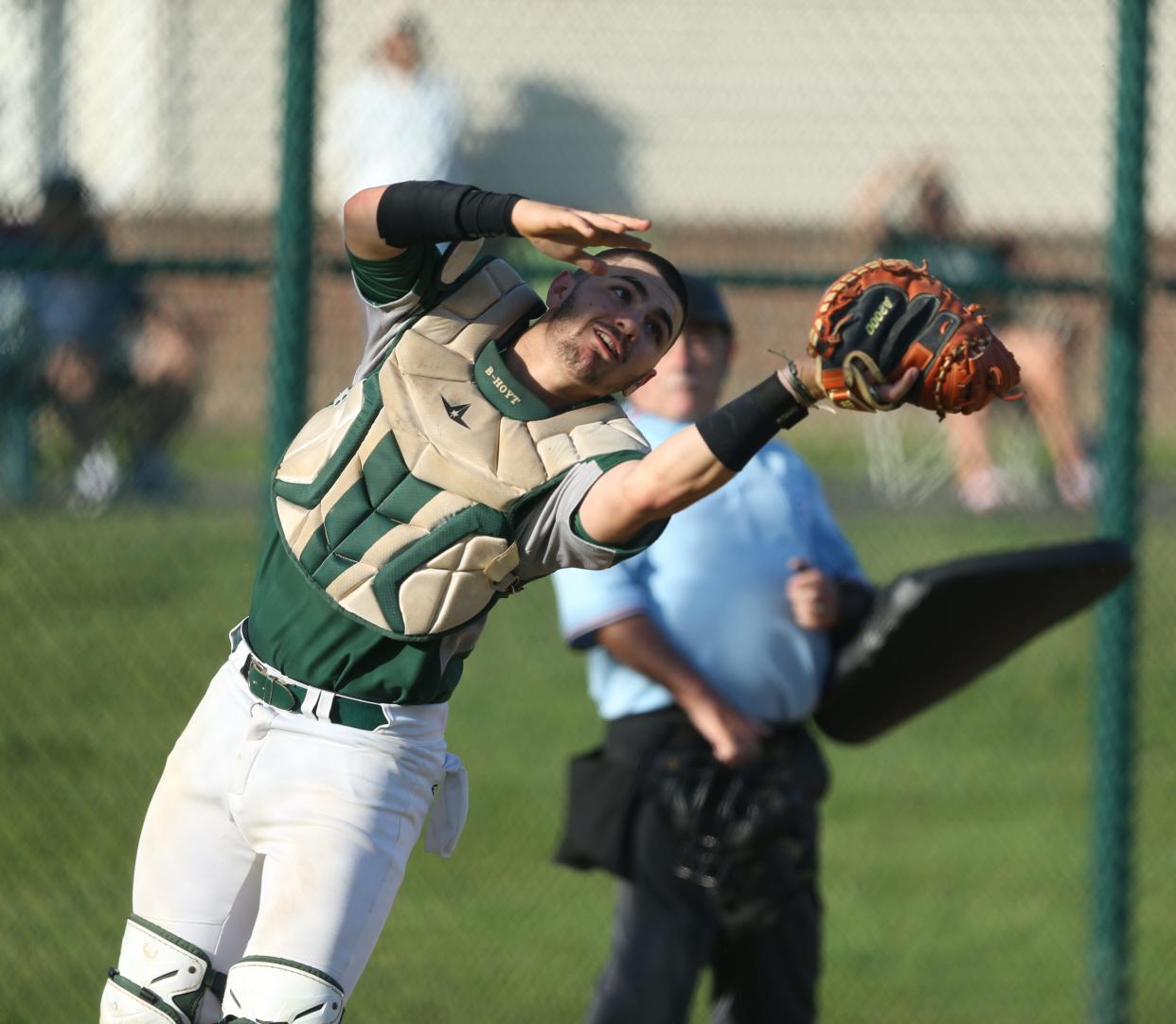 Spackenkill's Bryan Hoyt catches a pop up from New Paltz's Gavin Treglia during a game on May 7, 2024.