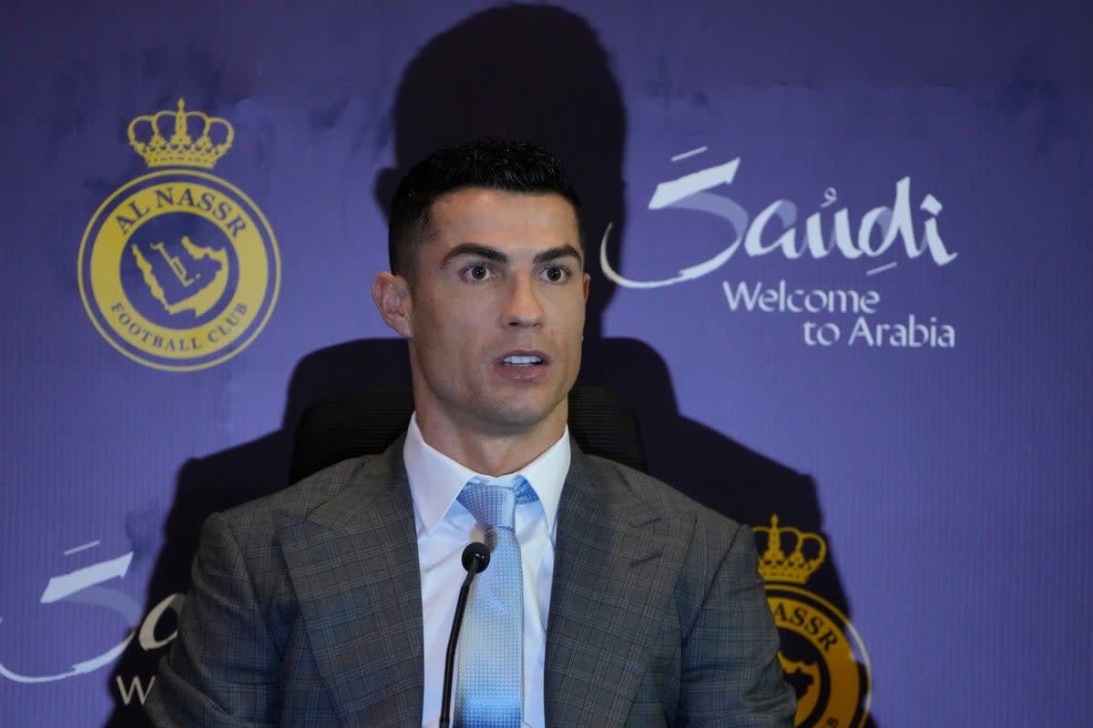 Cristiano Ronaldo has signed a two-and-a-half-year deal with Al Nassr (Amr Nabil/AP) (AP)