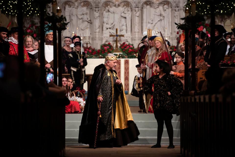 Mark Aliapoulios, from left, and Isabella Gabino perform as King Wenceslas and his page during the 2024 Boar's Head and Yule Log Festival on Saturday at The Episcopal Church of Bethesda-by-the-Sea in Palm Beach.