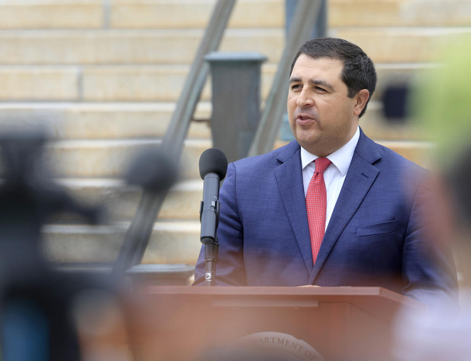 Wisconsin Attorney General Josh Kaul holds a news conference outside the Wisconsin State Capitol building in Madison, Wis. Tuesday, June 4, 2024. Kaul filed felony forgery charges Tuesday against two attorneys and an aide who helped submit paperwork falsely saying that former President Donald Trump had won the battleground state in 2020. (John Hart/Wisconsin State Journal via AP)