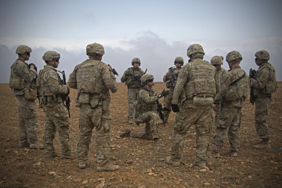 U.S. soldiers gather for a briefing during a combined joint patrol rehearsal in Manbij, Syria, on Nov. 7. (Photo: U.S. Army photo by Spc. Zoe Garbarino via AP)