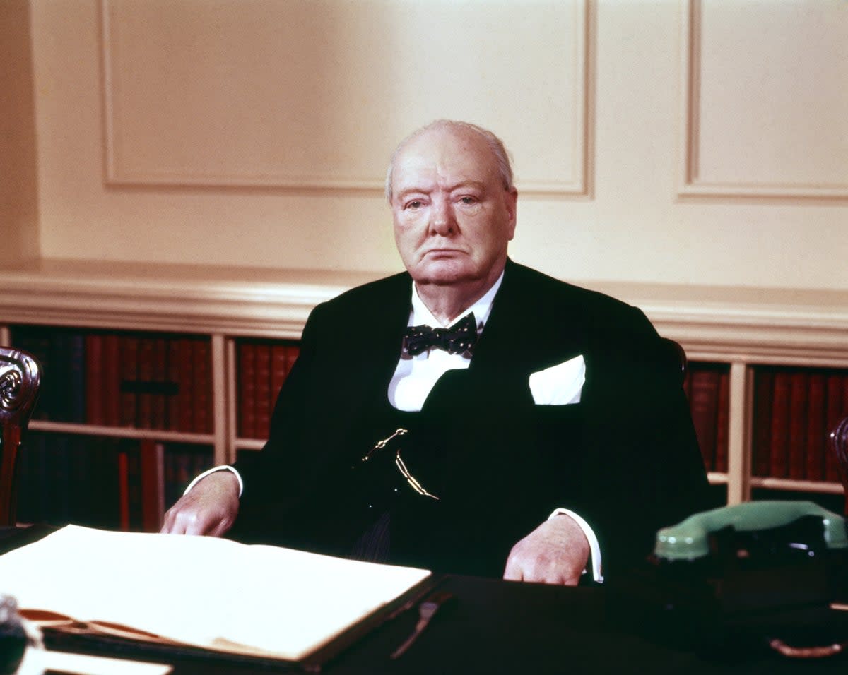 Sir Winston Churchill in the cabinet room at 10 Downing Street  (PA Archive)