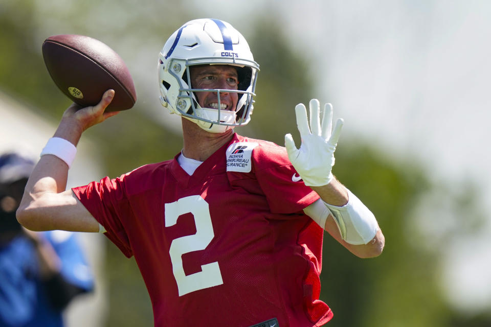 Indianapolis Colts quarterback Matt Ryan throws during practice at the NFL team's football training camp in Westfield, Ind., Thursday, July 28, 2022. (AP Photo/Michael Conroy)