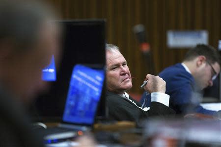 Defence leader Barry Roux looks on in court during the trial of Oscar Pistorius at the North Gauteng High Court in Pretoria, May 13, 2014. REUTERS/Daniel Born/Pool