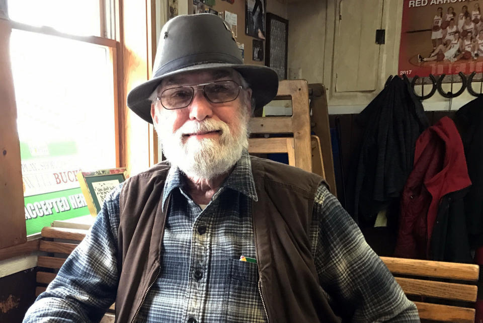 In this Tuesday, March 28, 2017, photo, retiree Robert Gillesse, poses for a photo in Lowell, Mich., as he discusses his views on President Donald Trump and the congressman representing his district, Rep. Justin Amash, R-Mich. Defying President Donald Trump on the Republican Party’s promise to repeal and replace Obamacare sounds like political suicide, especially in the congressional districts Trump won handily. But some Republicans who blocked the legislation won praise from constituents for stopping what many saw as a flawed plan, either in the legislation’s substance or strategy. (AP Photo/Chris Ehrmann)