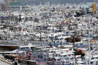 Fishing boats are anchored ahead of the arrival of Typhoon Hinnamnor at a port in Yeosu, South Korea, Sunday, Sept. 4, 2022. (Jang Duck-jong/Yonhap via AP)