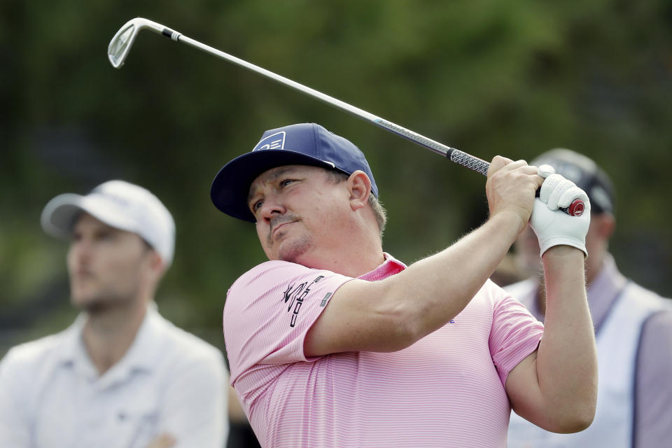 Jason Dufner watches his tee shot on the ninth hole during the first round of the Houston Open golf tournament Thursday, Nov. 11, 2021, in Houston. (AP Photo/Michael Wyke)