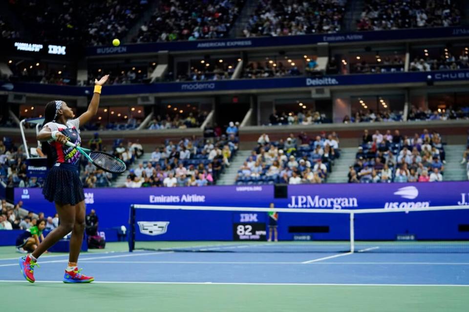 Coco Gauff serves to Caroline Garcia, of France, during the quarterfinals of the U.S. Open tennis championships, Tuesday, Sept. 6, 2022, in New York. (AP Photo/Frank Franklin II)