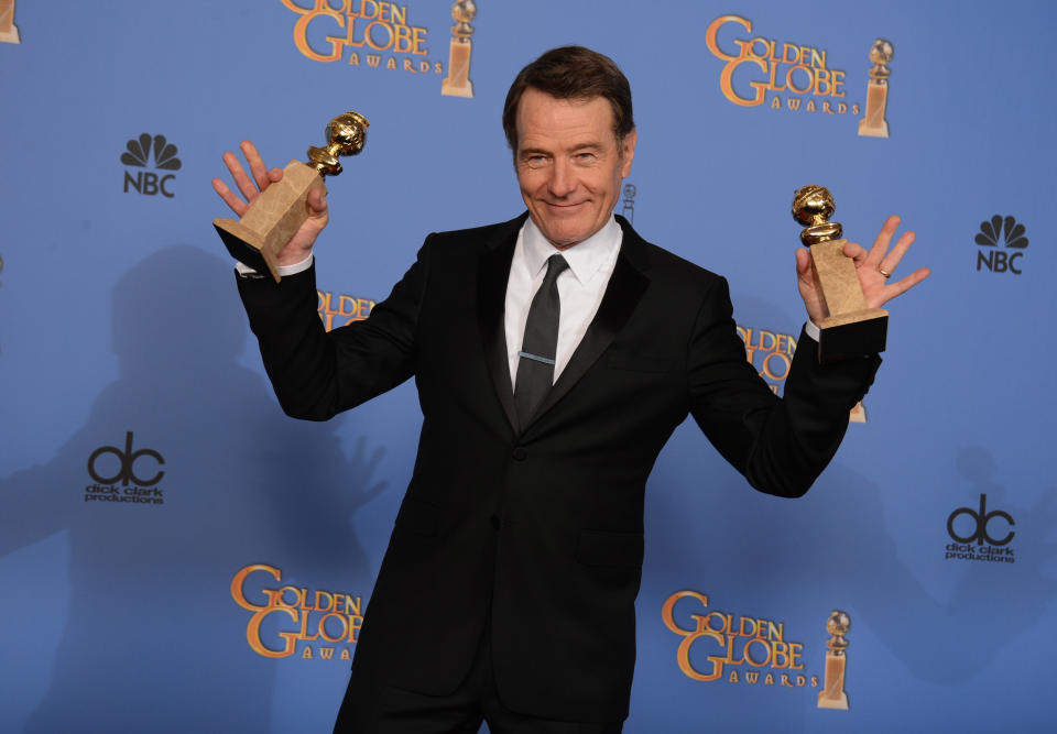 Bryan Cranston poses in the press room with the award for best tv series - drama for "Breaking Bad" and best actor in a tv series - drama for "Breaking Bad" at the 71st annual Golden Globe Awards at the Beverly Hilton Hotel on Sunday, Jan. 12, 2014, in Beverly Hills, Calif. (Photo by Jordan Strauss/Invision/AP)