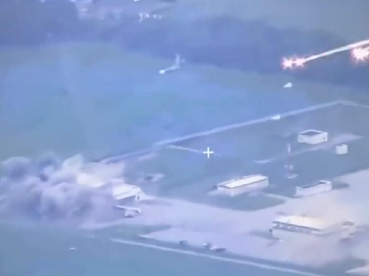 A Russian Su-34 jet is seen swooping low and dropping bombs over a border checkpoint in the Belograd region of Russia in May 2023.