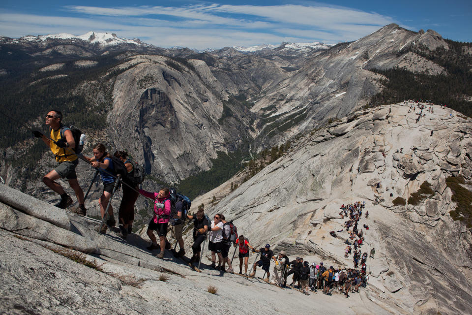 <strong>Length:</strong> 17 miles (27.4 kilometers) round-trip<br /><br /><strong>Wow Factor: </strong>Hang on for dear life to "hike" to the top of a big-wall climbing objective.<br /><br /><strong>Do It: </strong>While <a href="https://www.nps.gov/yose/index.htm" target="_blank">Yosemite</a>&rsquo;s Half Dome may be one of the most important targets for big-wall rock climbers on the planet, it&rsquo;s also possible to hike to the summit&mdash;sort of. The famed 400-foot (121.9-meter) cable route leads those without the skills to climb up the massive chunk of granite that rises 5,000 feet (1,524 meters) above the valley floor, but it&rsquo;s <a href="http://news.nationalgeographic.com/2015/07/150731-is-half-dome-too-dangerous/">one harrowing ascent</a>. Hikers hold on to the two cables for dear life with the void looming below. OK, it&rsquo;s not <i>that</i> bad, and according to the National Park Service, &ldquo;since 1919, relatively few people have fallen and died on the cables.&rdquo; The danger certainly does not stop thousands of visitors from heading up the route each year. Don&rsquo;t discount the rest of the hike, either. It&rsquo;s a big, long slog up 4,800 vertical feet (1,463 meters) in some of the park&rsquo;s deepest wilderness just to reach the cables.<br /><br /><strong>Don&rsquo;t: </strong>Head up the cables when bad weather is looming. The route is as exposed as it gets and can be deadly in lightning storms or when the rock is wet.