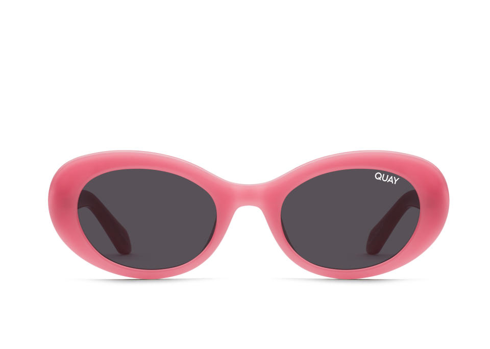 QUAY X PARIS SHOW UP sunnies with pink oval frames and dark lenses.