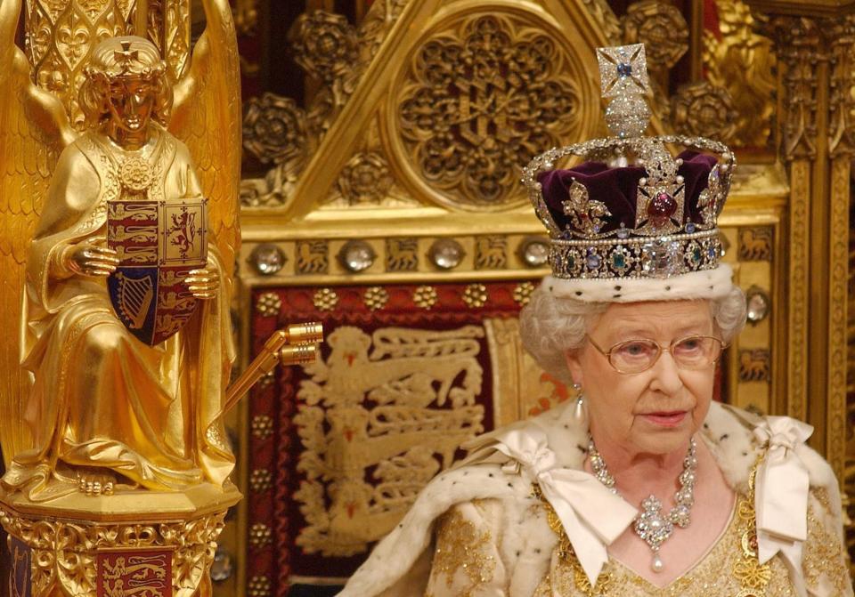 2004: Britain's Queen Elizabeth II delivers her speech in the chamber of the House of Lords, Westminster, in London on Nov. 23, 2004. Security was the key theme of the queen's speech.