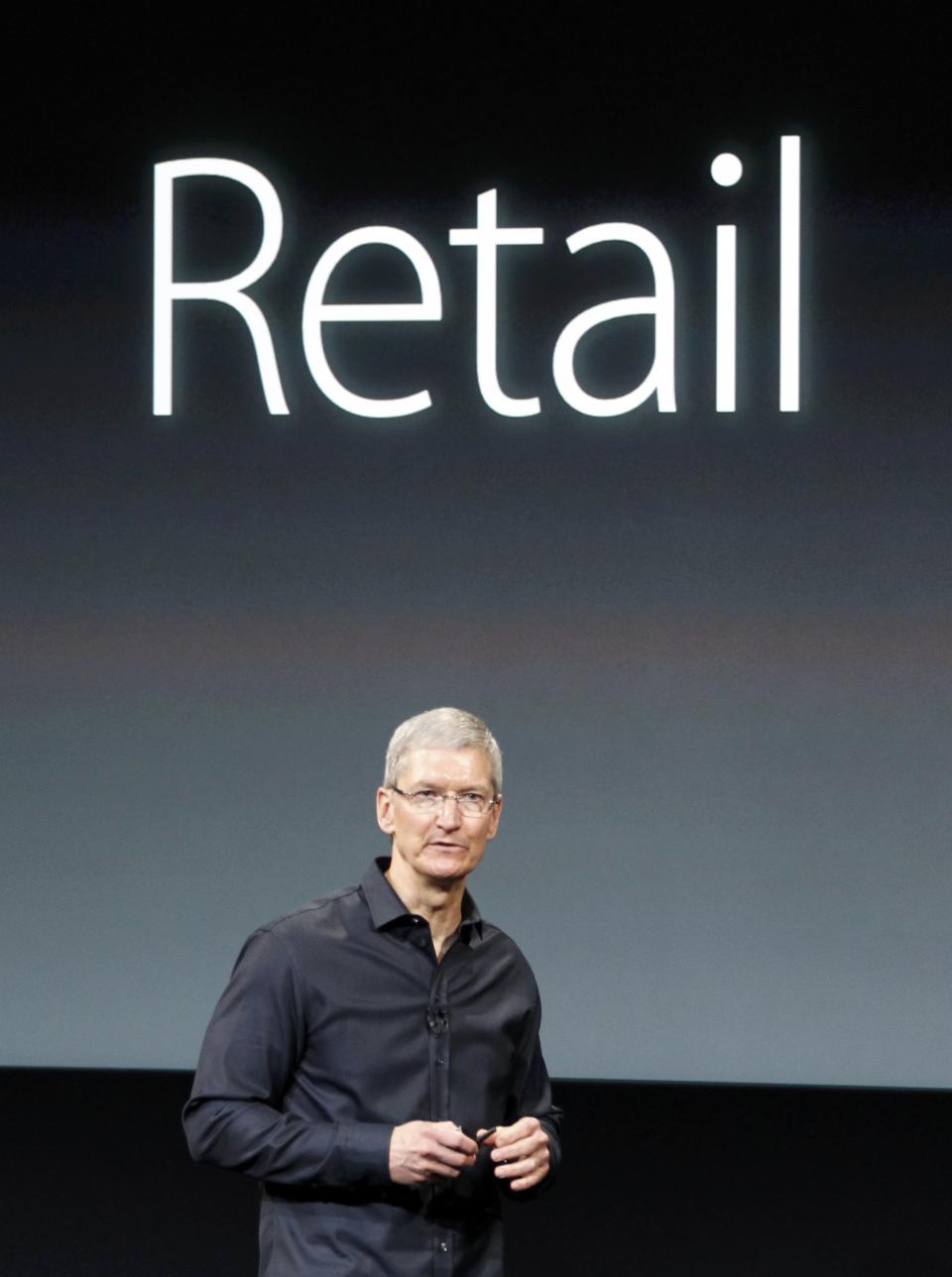 Apple Inc CEO Tim Cook speaks during Apple Inc's media event in Cupertino, California September 10, 2013. (REUTERS/Stephen Lam)