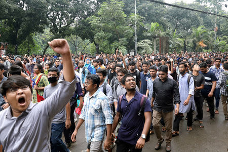 FILE PHOTO: Students shout slogan during a rally as they join in a protest over recent traffic accidents that killed a boy and a girl, in Dhaka, August 5, 2018. REUTERS/Mohammad Ponir Hossain