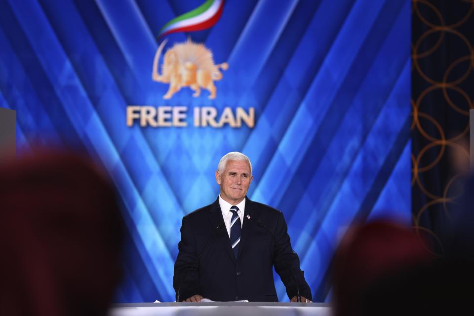 Former U.S. Vice President Mike Pence pauses during his speech at the Iranian opposition headquarters in Albania, where up to 3,000 MEK members reside at Ashraf-3 camp in Manza town, about 30 kilometers (16 miles) west of Tirana, Albania, Thursday, June 23, 2022. (AP Photo/Franc Zhurda)