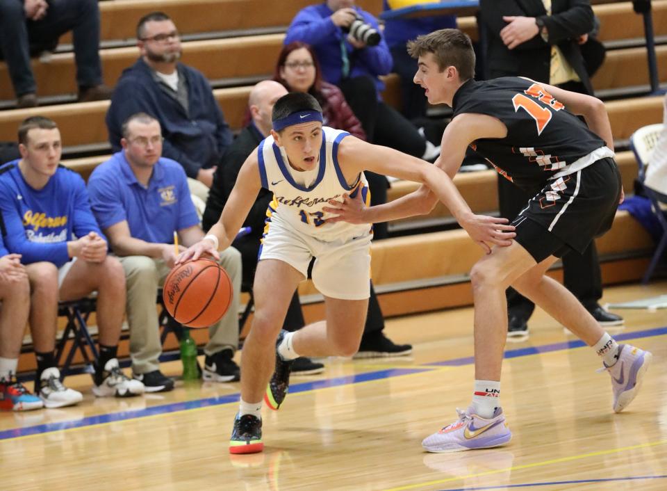 Eastin Kegley of Jefferson drives the baseline against Summerfield’s Tyler Dafoe during a 57-40 Summerfield win Tuesday night.