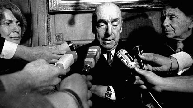 Pablo Neruda, poet and then Chilean ambassador to France, talks to reporters in Paris after winning the 1971 Nobel Prize for Literature. Mystery continues to surround what caused the 1973 death of Neruda at age 69.  (Laurent Rebours/Associated Press - image credit)