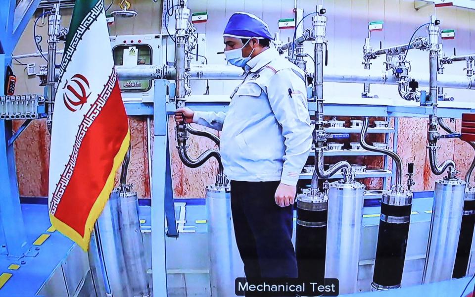 An engineer inside the Natanz uranium enrichment plant, shown on TV locally as part of a ceremony to mark Iran's National Nuclear Technology Day on April 10 - AFP